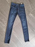 Donkerblauwe spijkerbroek - herenmaat 28/34 -  als nieuw, Blauw, Refill, Ophalen of Verzenden, Zo goed als nieuw