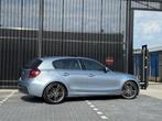 BMW 1-serie 130i High Executive LCI - AUTOMAAT - SCHUIFDAK -, Achterwielaandrijving, Gebruikt, Zwart, Blauw