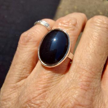 Mooie nieuwe zilveren ring met een ovale Onyx mt 17,5 beschikbaar voor biedingen