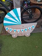 Geboortebord wieg met naam, Ophalen