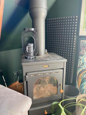 Fireplace for sale Amsterdam, used 5 times, as new.  beschikbaar voor biedingen