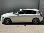 BMW 1-serie M135i xDrive High Executive l Schuifdak l Volled, Gebruikt, 320 pk, Wit, Leder
