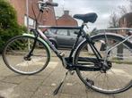 Tweedehands Herenfiets met groen spatbord, Ophalen of Verzenden