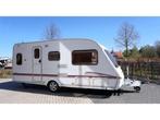 Swift Charisma 555 + voortent en luifel, zitgroep voorin, Caravans en Kamperen, Caravans, Overige typen, Rondzit, Schokbreker