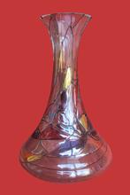 Aparte iriserende vaas, Ophalen