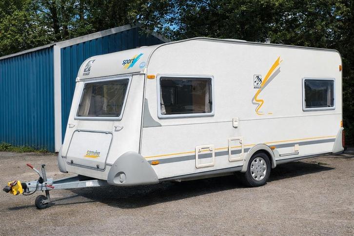 Knaus Sudwind 450  4-persoons caravan uit 1999, Caravans en Kamperen, Caravans, Bedrijf, tot en met 4, Rondzit, Knaus, Kachel