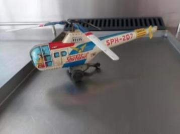 Oude blikken helikopter -Sky Patrol beschikbaar voor biedingen