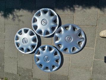 4x originele opel astra g wieldoppen  beschikbaar voor biedingen