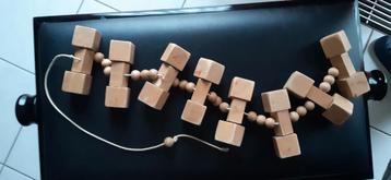 Houten trekslang v kantelende =rollende  blokjes / hout beschikbaar voor biedingen