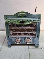 Gietijzer spiraalkacheltje..., Ophalen