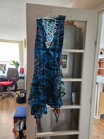 Mooie wikkeljurk merk didi maat xxl blauw mooie print, Kleding | Dames, Jumpsuits, Verzenden, Zo goed als nieuw, Maat 46/48 (XL) of groter