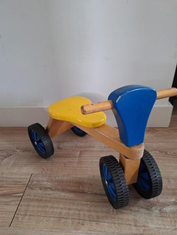 Houten fietsje geel blauw beschikbaar voor biedingen