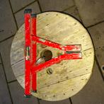 Trekhaakslot, Motoren, Ophalen