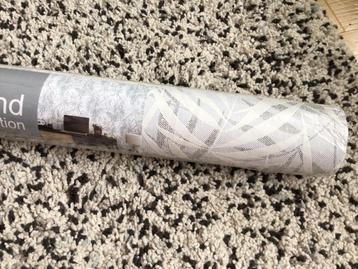 Rol behang van Action Palm Takjes beschikbaar voor biedingen