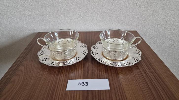 2x theekopjes Jena glas met zilverkleurige schotels, Huis en Inrichting, Keuken | Servies, Gebruikt, Glas of Glazen, Overige stijlen