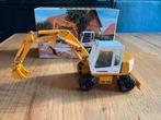 Conrad 2833 1/50 Liebherr A 310 hydraulische graafmachine, Ophalen of Verzenden, Zo goed als nieuw, Hijskraan, Tractor of Landbouw