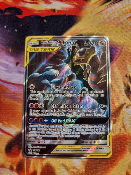 Garchomp & giratina tag team sm193 nm, Hobby en Vrije tijd, Verzamelkaartspellen | Pokémon, Zo goed als nieuw, Losse kaart, Ophalen of Verzenden