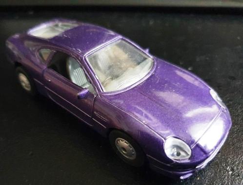 Maisto Shell Aston Martin DB7 paars, Hobby en Vrije tijd, Modelauto's | Overige schalen, Gebruikt, Auto, Ophalen of Verzenden