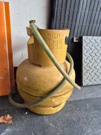 Oude gasfles met slang en drukregelaar, Ophalen, Gebruikt