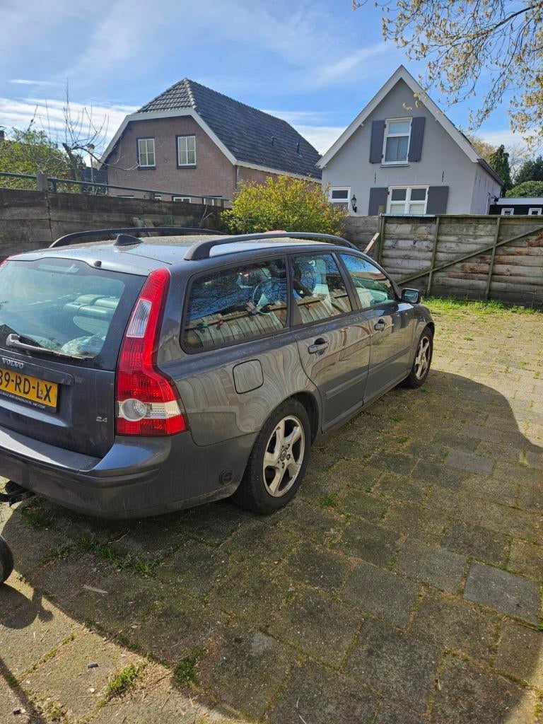 Volvo V50 2.4 140PK 2005 Grijs, Auto's, Volvo, Particulier, V50, LPG, D, Stationwagon, Handgeschakeld, Origineel Nederlands, Zilver of Grijs