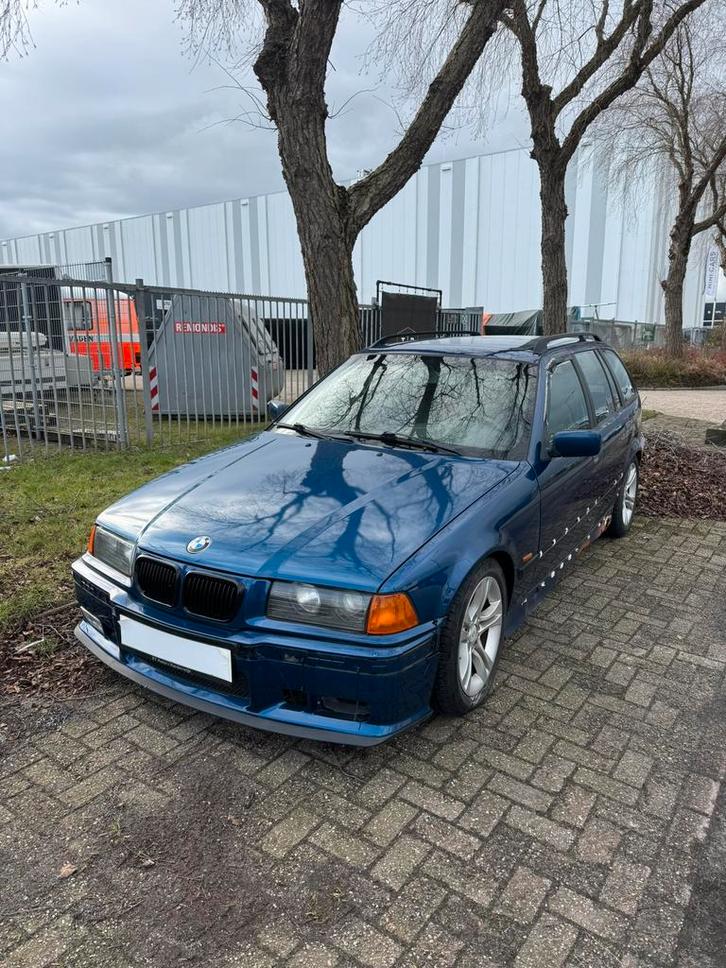 E36 323i touring avusblauw handbak met werk motorisch goed, Auto's, BMW, Particulier, 3-Serie, ABS, Airconditioning, Alarm, Boordcomputer