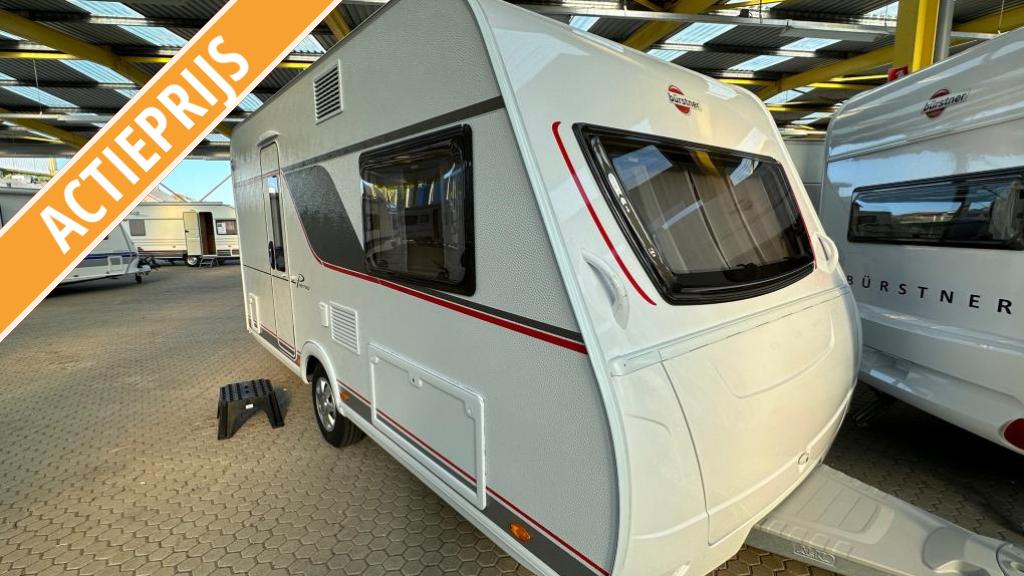 Bürstner Premio 395 TS Bed 210 cm NIEUW MET GEBRUIK, Caravans en Kamperen, Treinzit, Tot en met 3, Bürstner, 5 tot 6 meter