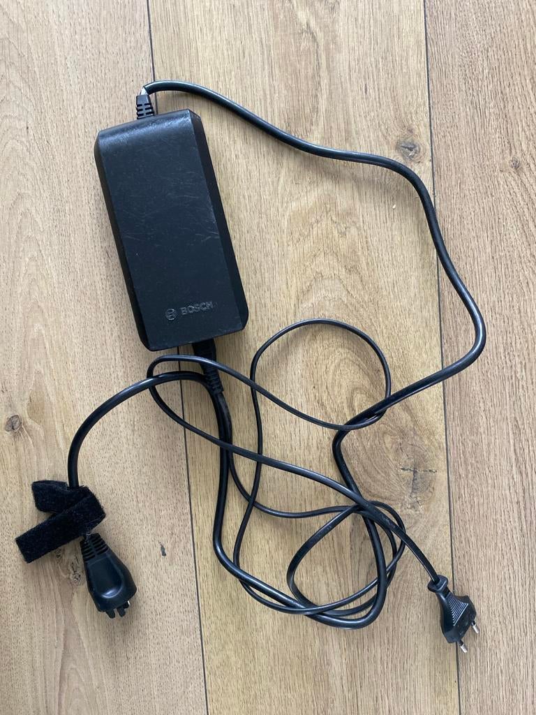 Bosch e-bike acculader, Fietsen en Brommers, Fietsaccessoires | Fietsaccu's, Ophalen, Gebruikt