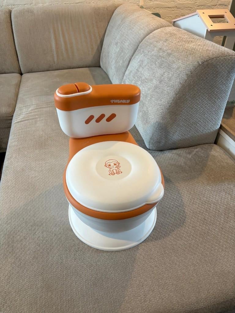 Nieuwstaat Twinky Training WC met muziek & spoelgeluid, Kinderen en Baby's, Badjes en Verzorging, Ophalen, Zo goed als nieuw, Overige typen