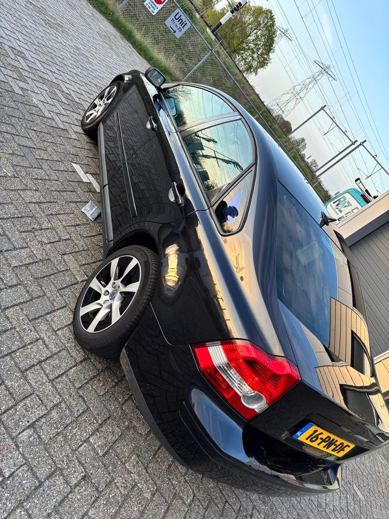 Volvo S40 II 2.4 103KW 2004 Zwart, Voorwielaandrijving, Stoelverwarming, Beige, 700 kg