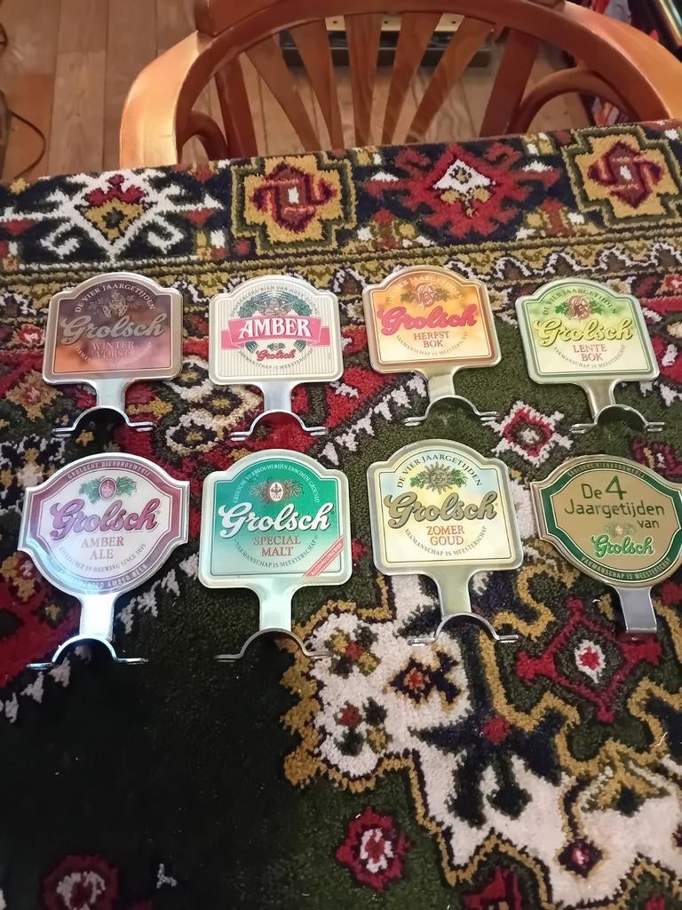 8 stuks grolsch tapkraanhouder/tapruiters., Ophalen, Zo goed als nieuw