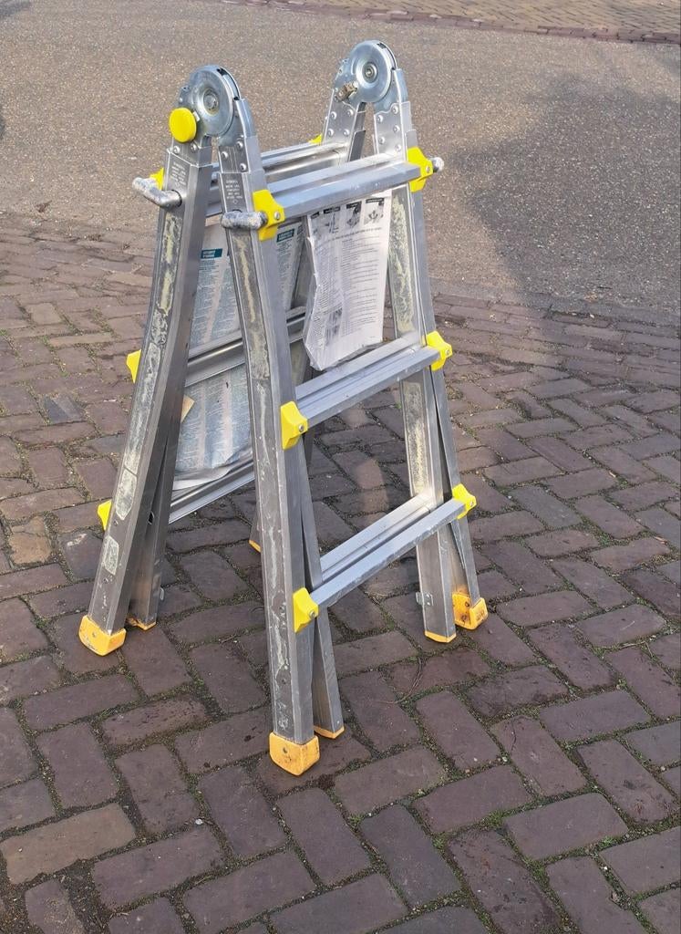 Te koop aluminium knik ladder- trap, Ophalen of Verzenden, 4 meter of meer