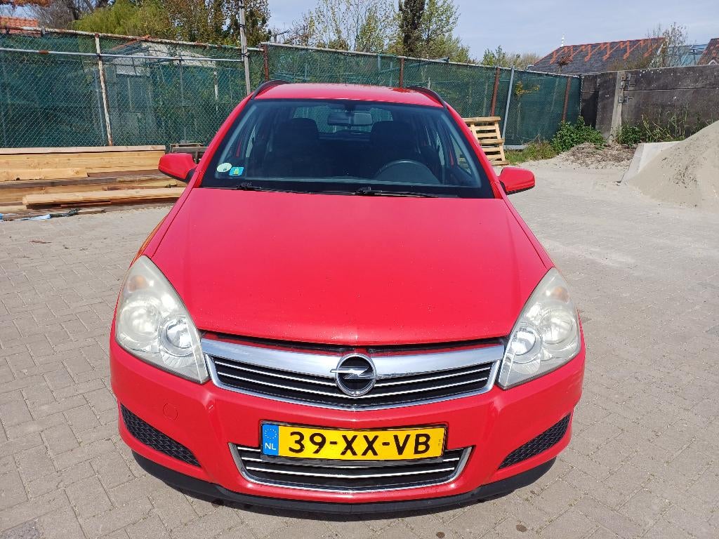 Opel Astra 1.4 16V St.wgn. 2007 Rood airco nieuwe apk, Voorwielaandrijving, 639 kg, Stof, Origineel Nederlands