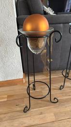 Plantenstandaard met stolp, Ophalen