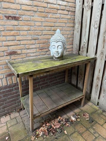 Gratis oppottafel en tuinbeeld beschikbaar voor biedingen