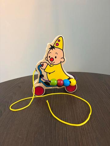 Bumba trekfiguur met kralen beschikbaar voor biedingen