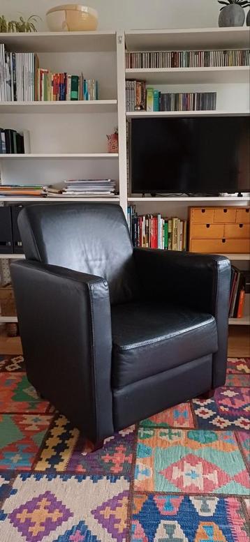 Zwarte leren fauteuil in goede staat