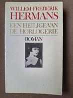W F Hermans	Een heilige van de horlogerie	1e druk	1987, Ophalen of Verzenden, Zo goed als nieuw