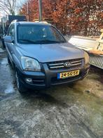 Kia Sportage 2.0 4WD 2006 Grijs, Auto's, 142 pk, 4 cilinders, Origineel Nederlands, Handgeschakeld