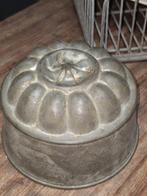 Grote oude metalen bakvorm, Ophalen