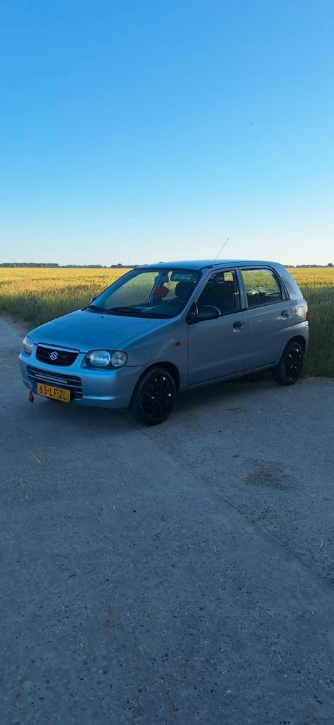 Suzuki Alto 1.1 16V 5d AGS 2002 Grijs, Auto's, Suzuki, Particulier, Alto, Airbags, Bluetooth, Centrale vergrendeling, Elektrische ramen