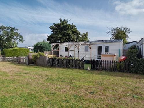 Nette stacaravan met airco en dubbelglas, Caravans en Kamperen, Caravans, Particulier, tot en met 4, Overige, Lengtebed, Vast bed