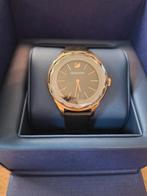 Swarovski dames horloge zwart/goud (zgan), Overige merken, Leer, Polshorloge, Ophalen of Verzenden