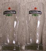 2 Heineken bierglazen met achterzijde wit logo in spiegelbee, Verzamelen, Biermerken, Verzenden, Nieuw, Glas of Glazen, Overige merken