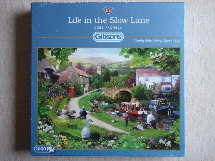 1000 Gibsons Puzzel: Czes Pachela - Life in the Slow Lane, Hobby en Vrije tijd, Denksport en Puzzels, Gebruikt, Legpuzzel, 500 t/m 1500 stukjes