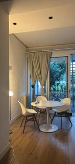 Ronde witte eettafel met 4 stoelen, Huis en Inrichting, Tafels | Eettafels, 100 tot 150 cm, Kunststof, Rond, Ophalen of Verzenden