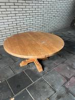 Ronde houten tafel, Ophalen