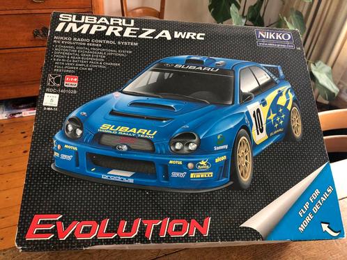 Electrish Bestuurdebare Subaru impreza, Hobby en Vrije tijd, Modelauto's | Overige schalen, Zo goed als nieuw, Ophalen of Verzenden