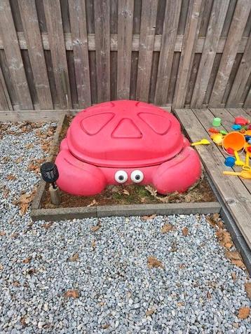 Krab-zandbak beschikbaar voor biedingen