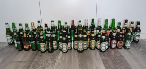 Grote serie Heineken flesjes 75+. Meerderheid vol, Verzamelen, Biermerken, Zo goed als nieuw, Flesje(s), Heineken, Ophalen of Verzenden