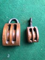 Twee katrollen hout, Ophalen